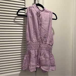 Purple, peplum-style top from Dress Up. Size large.